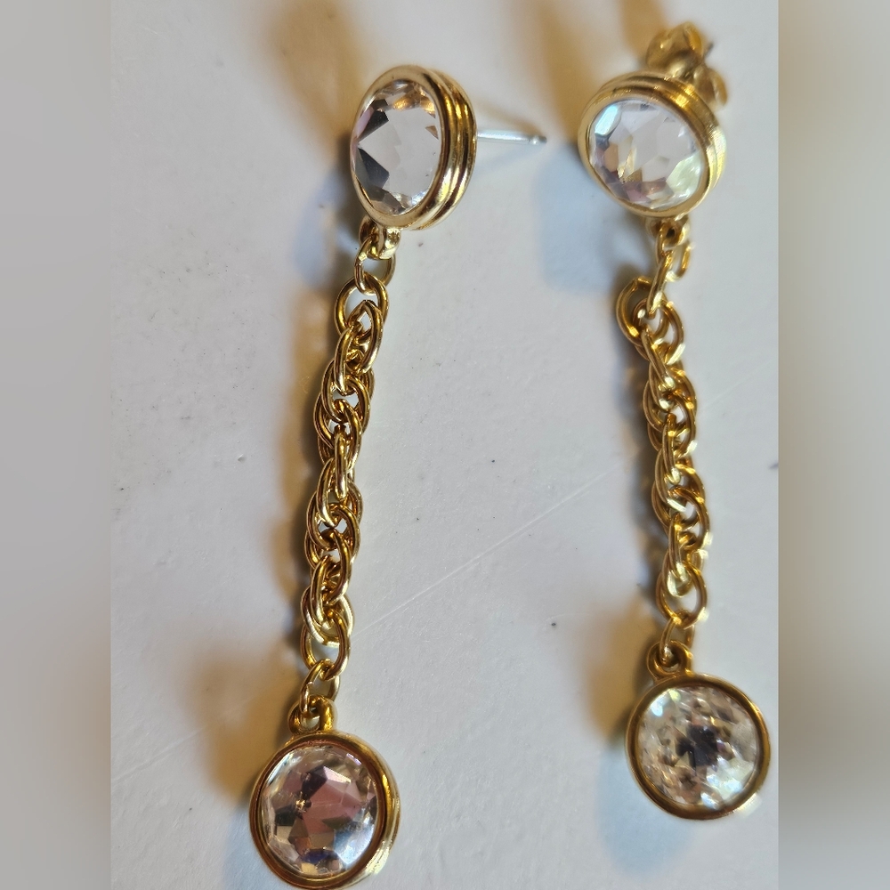 Gold tone chain drop earrings with clear gemstones
